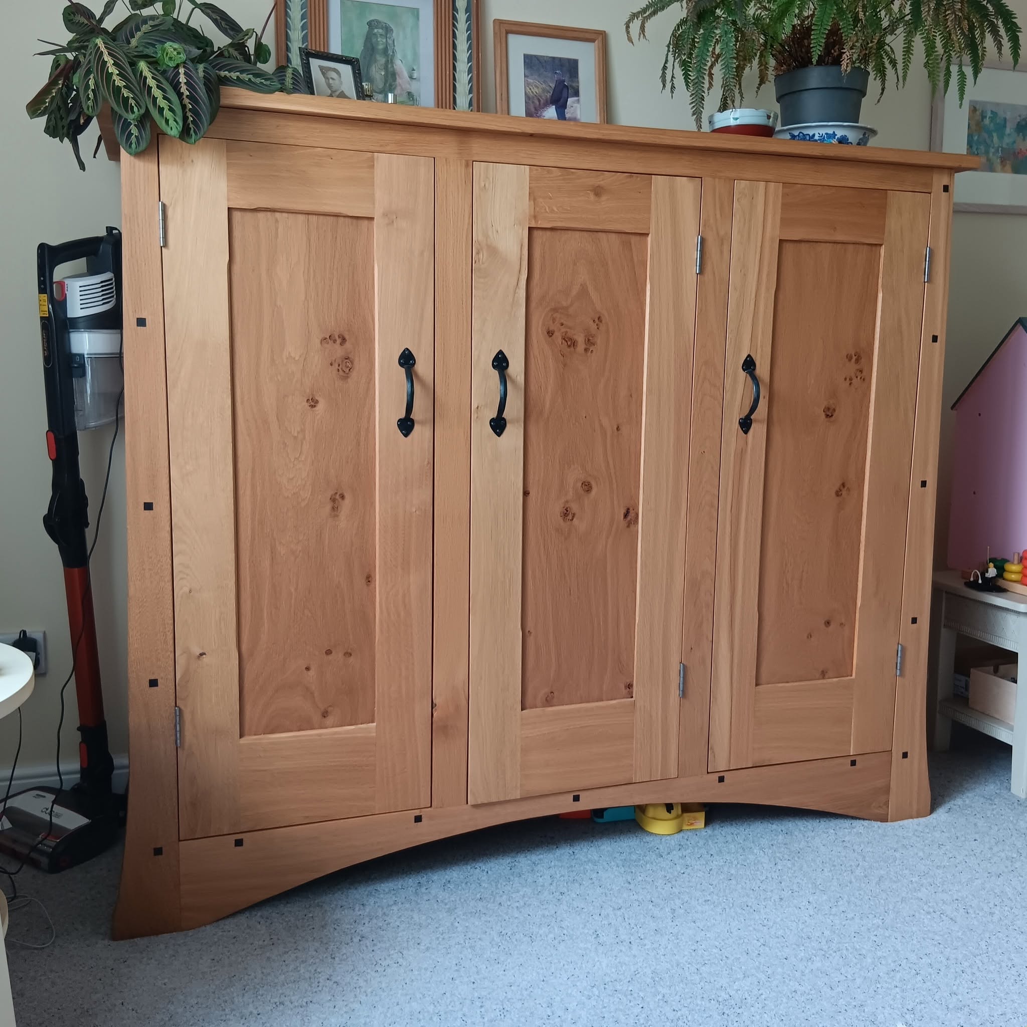 Solid oak three-door cupboard