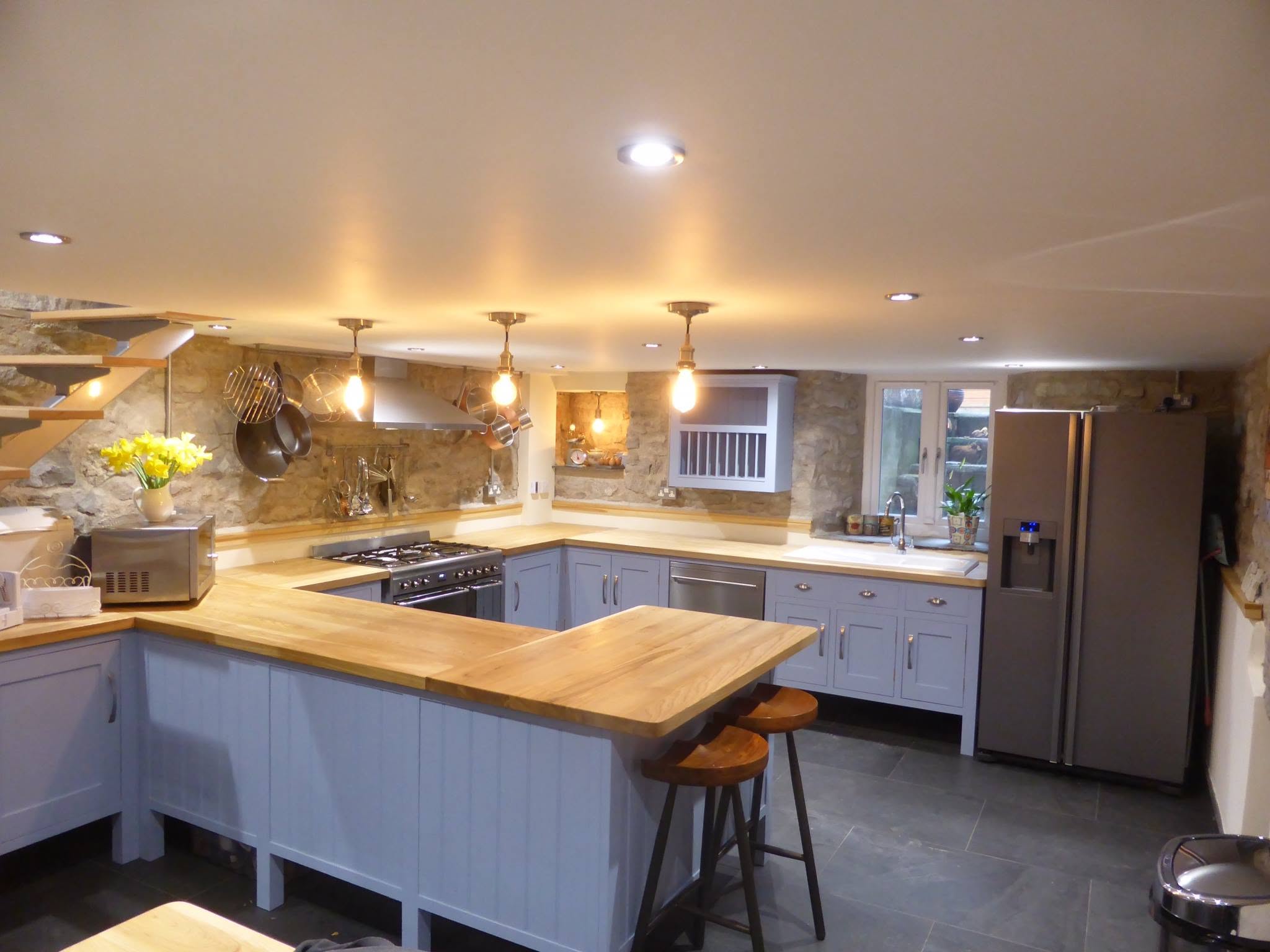 Painted cottage kitchen with oak worktops